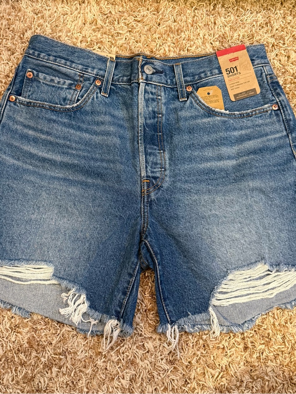 Levi's Distressed 501 Denim Shorts in Medium Blue